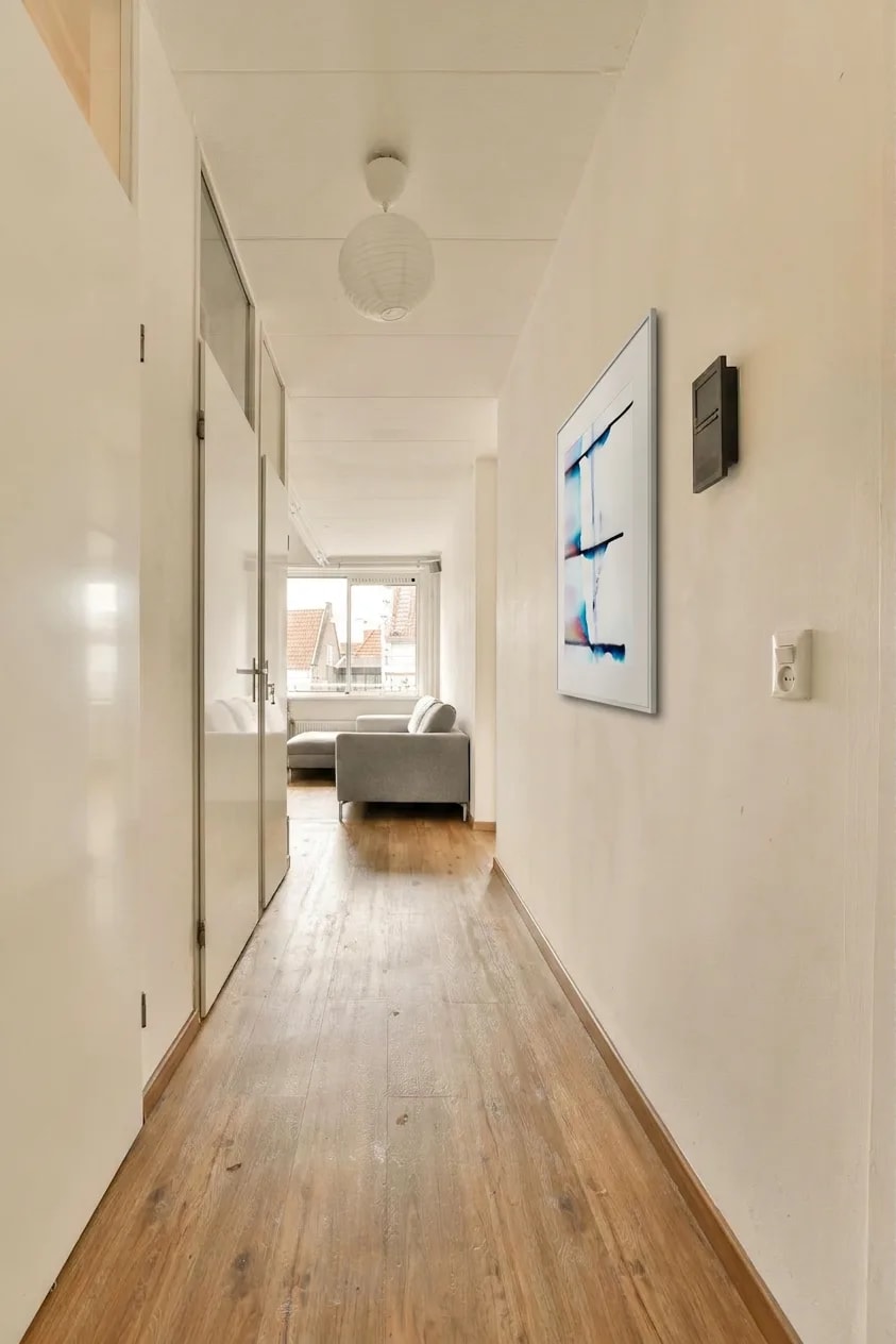 After — hallway with wall art: Hallway visualisation with wall art added.